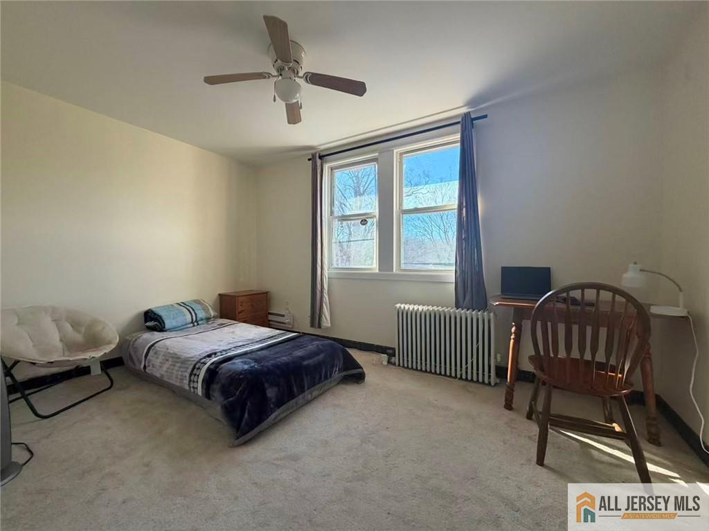 57 North Disbrow Hill Road Monroe Township, NJ 08831 - Photo 16 of 24 a bedroom with a bed and a window