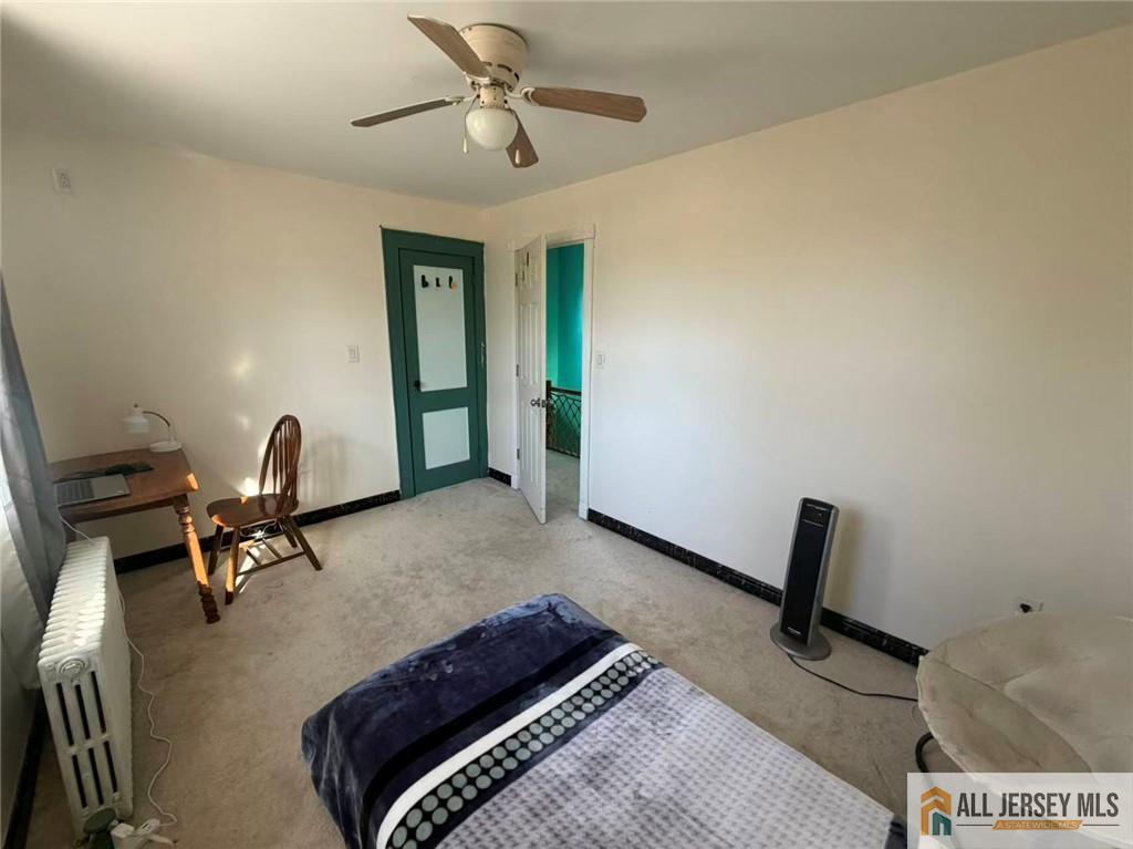 57 North Disbrow Hill Road Monroe Township, NJ 08831 - Photo 19 of 24 a bedroom with furniture and a window