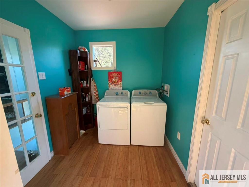 57 North Disbrow Hill Road Monroe Township, NJ 08831 - Photo 6 of 24 a utility room with dryer and washer