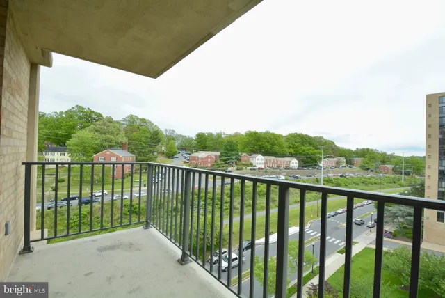 a balcony with outdoor view