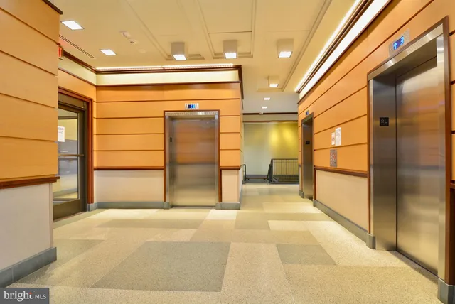 a view of a porch with a door and a window