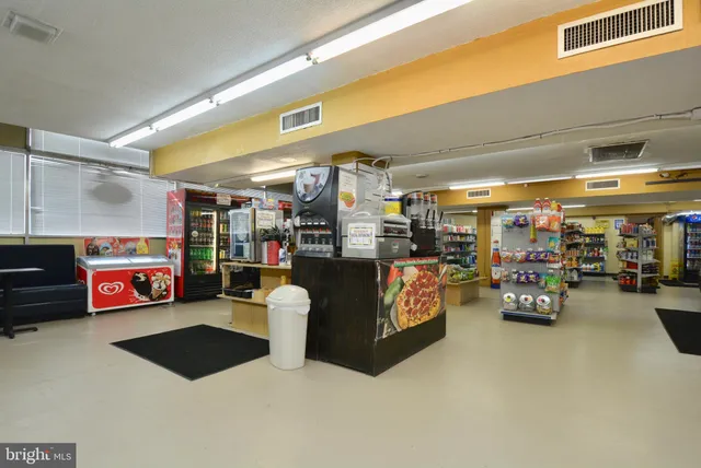a garage with a car and bike parked