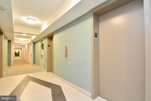 a bedroom with a bed and a bathroom