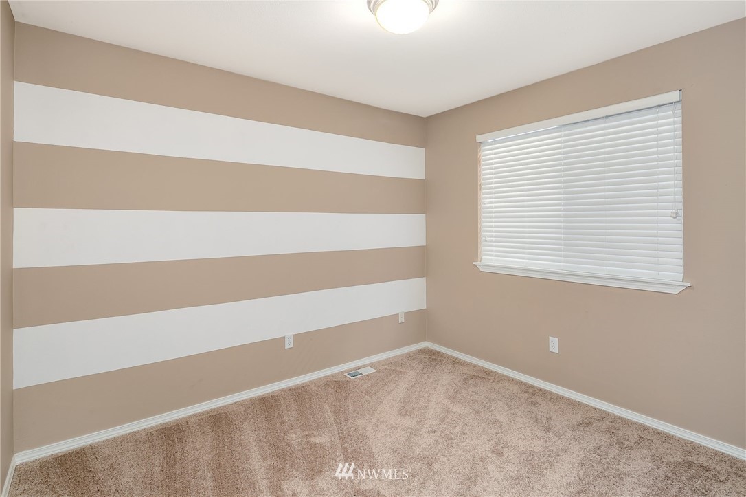2522 Stafford Way Bothell, WA 98012 - Photo 16 of 23 a view of an empty room with a window