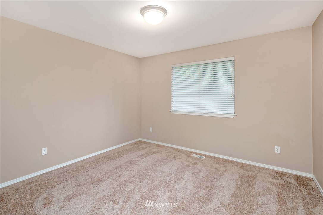 2522 Stafford Way Bothell, WA 98012 - Photo 17 of 23 an empty room with a window