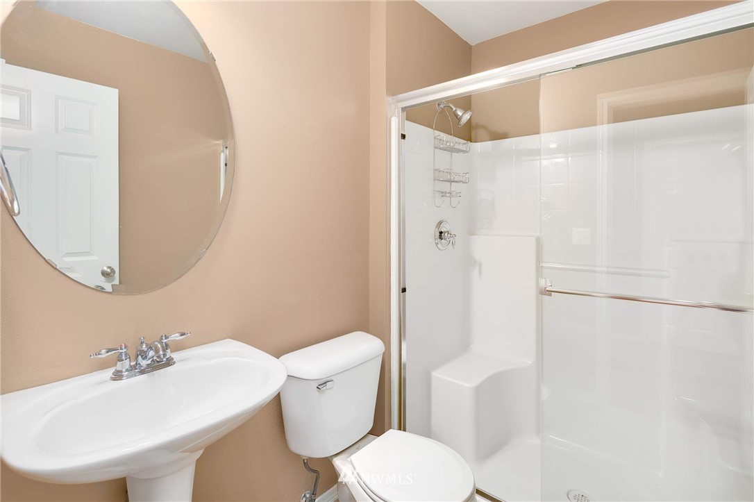 2522 Stafford Way Bothell, WA 98012 - Photo 18 of 23 a white toilet sitting next to a bathroom sink