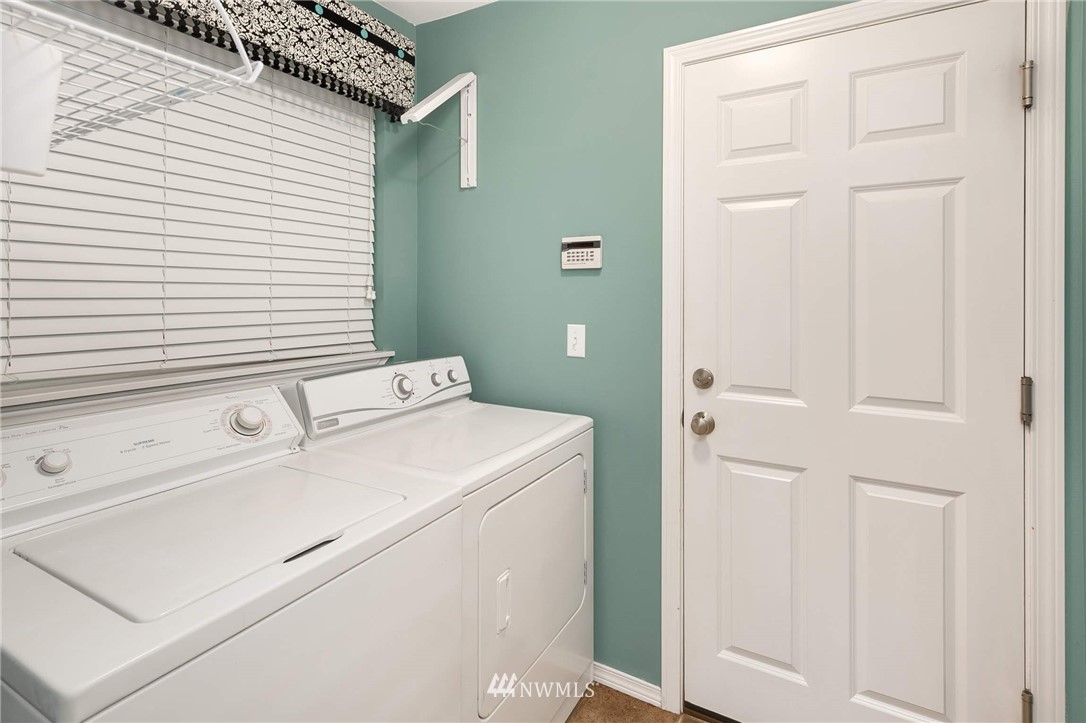 2522 Stafford Way Bothell, WA 98012 - Photo 19 of 23 a utility room with dryer and washer