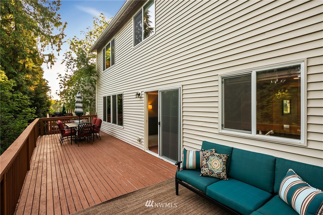 2522 Stafford Way Bothell, WA 98012 - Photo 20 of 23 a wooden bench sitting in front of a house