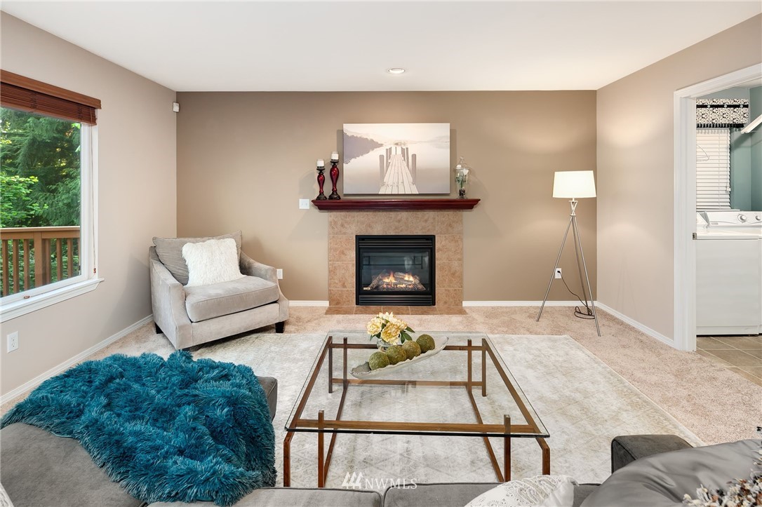 2522 Stafford Way Bothell, WA 98012 - Photo 10 of 23 a living room with furniture and a fireplace