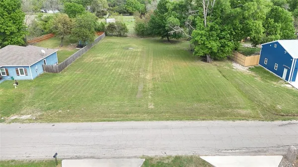 a view of swimming pool with a yard