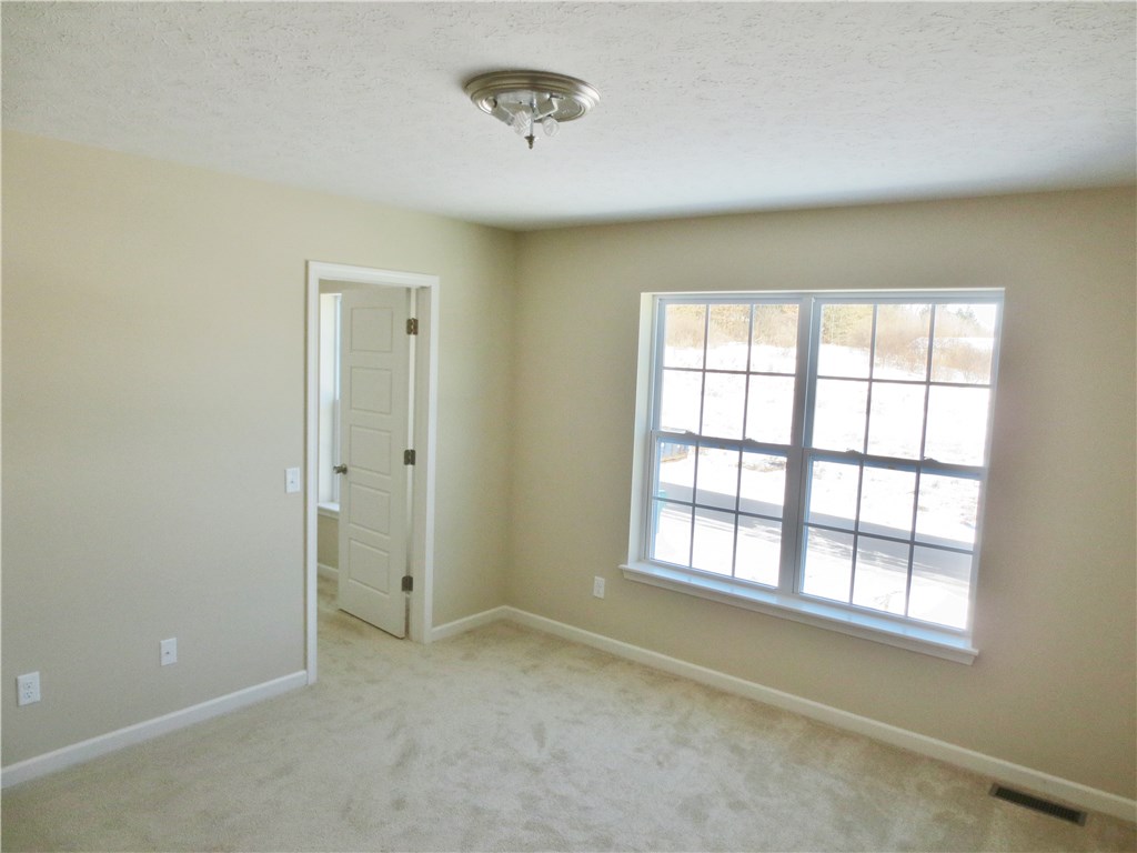 81 Beaver Road Chili, NY 14546 - Photo 14 of 20 15'x13' Second Bedroom with Walk-in Closet. Photo