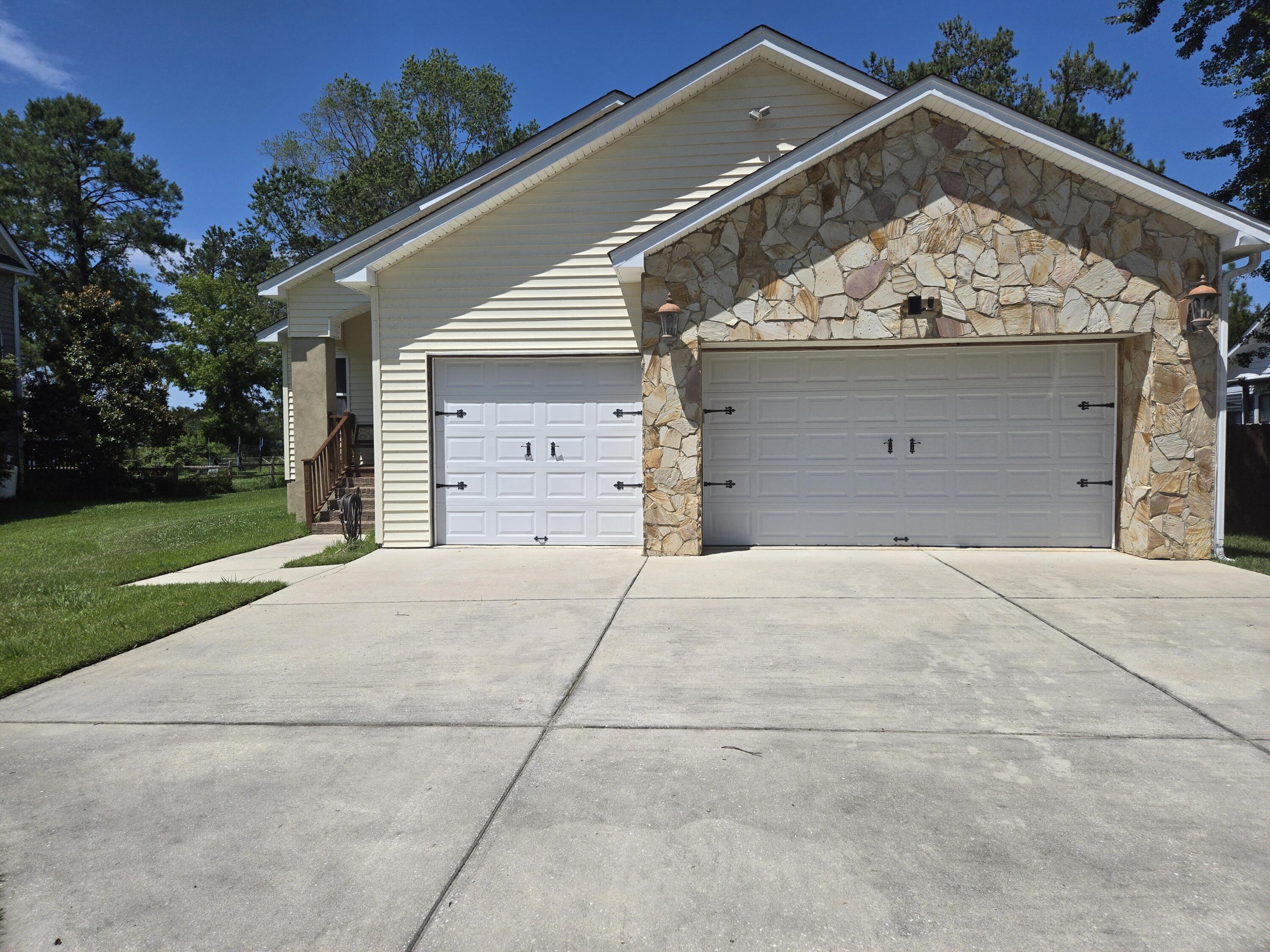 1100 Churchill Road Moncks Corner, SC 29461 - Photo 3 of 25 3 car garage with extra long driveway