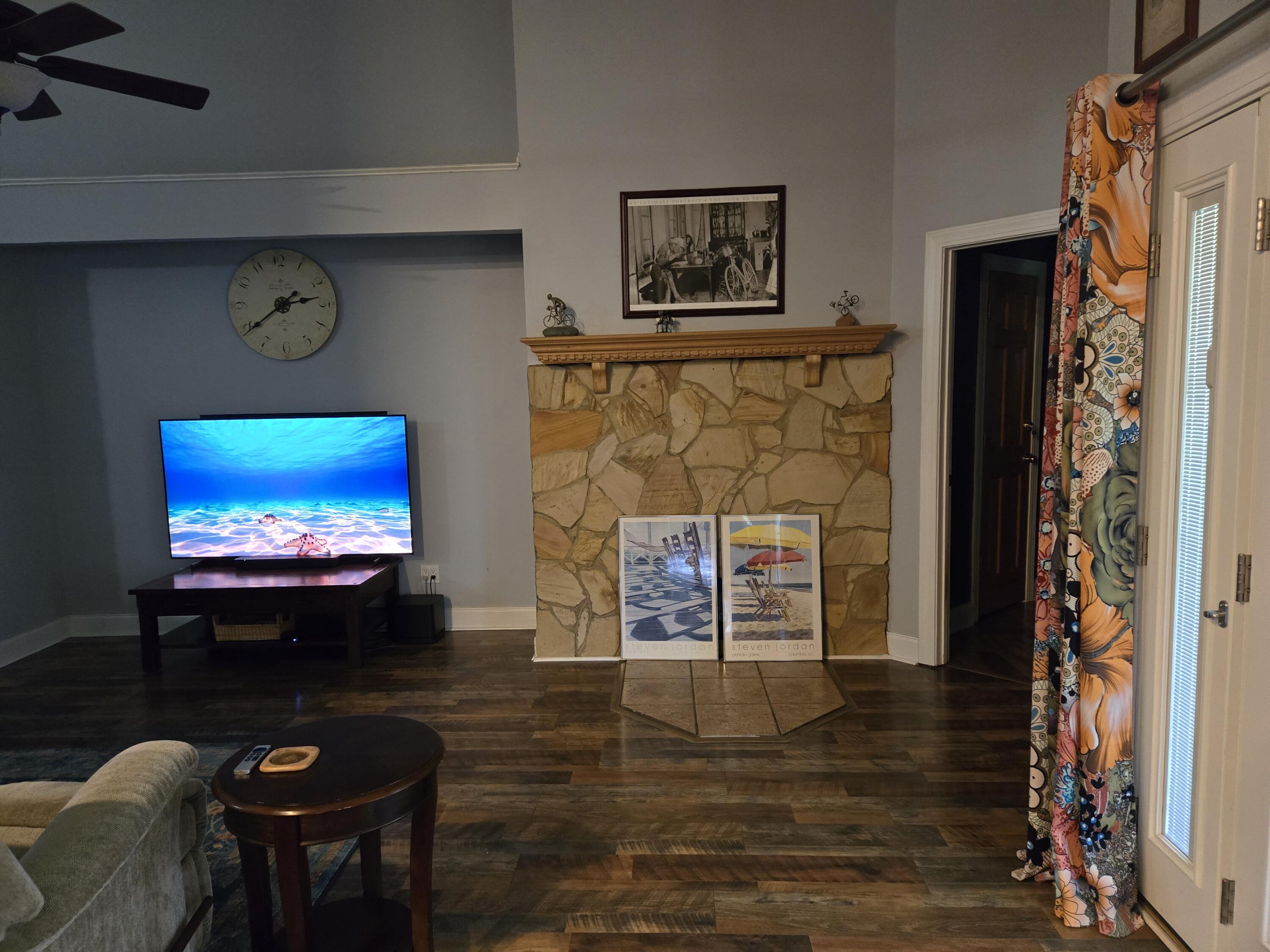 1100 Churchill Road Moncks Corner, SC 29461 - Photo 5 of 25 Open living room has a ceiling fan