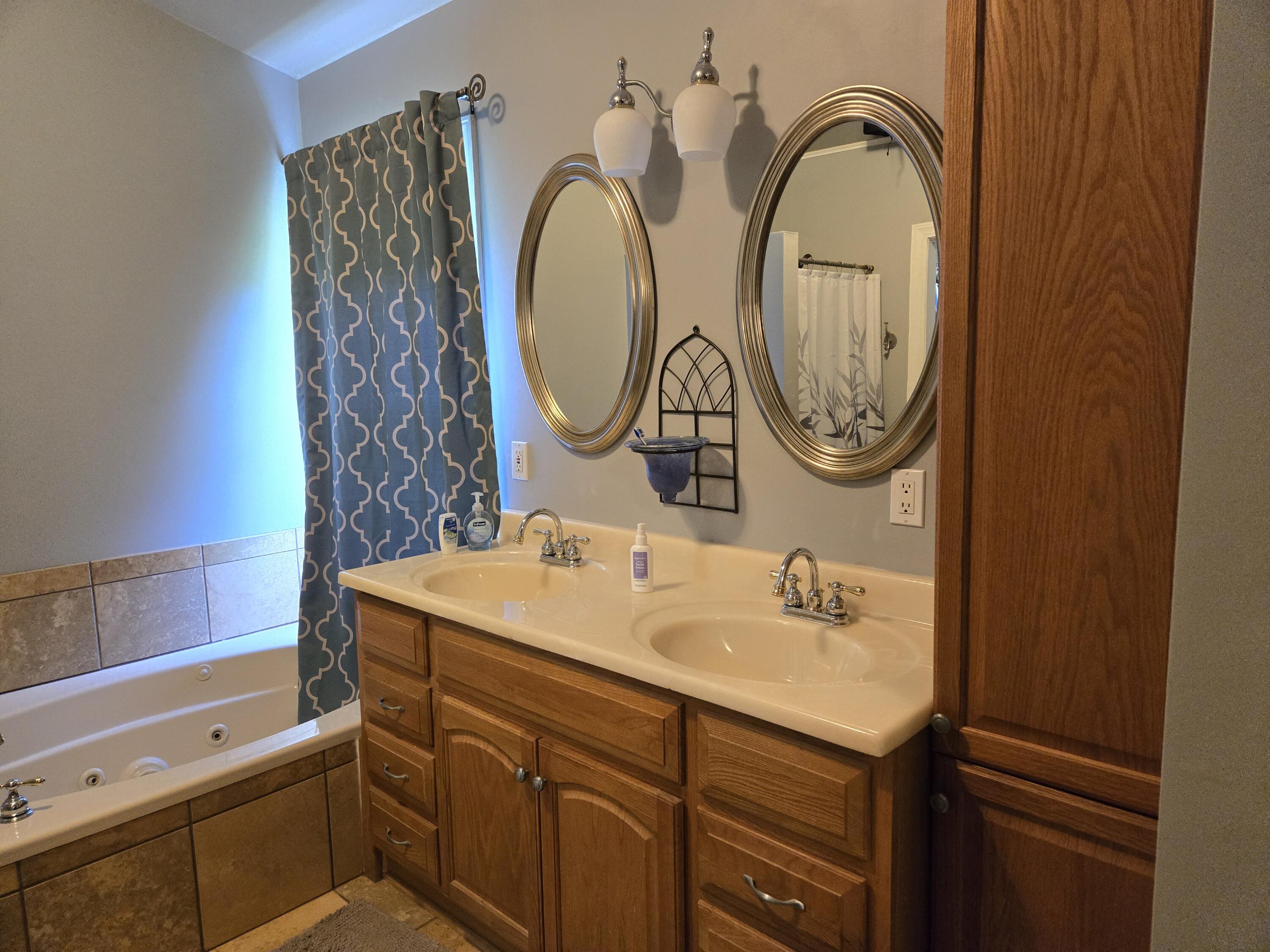 1100 Churchill Road Moncks Corner, SC 29461 - Photo 10 of 25 Primary bathroom has double vanities