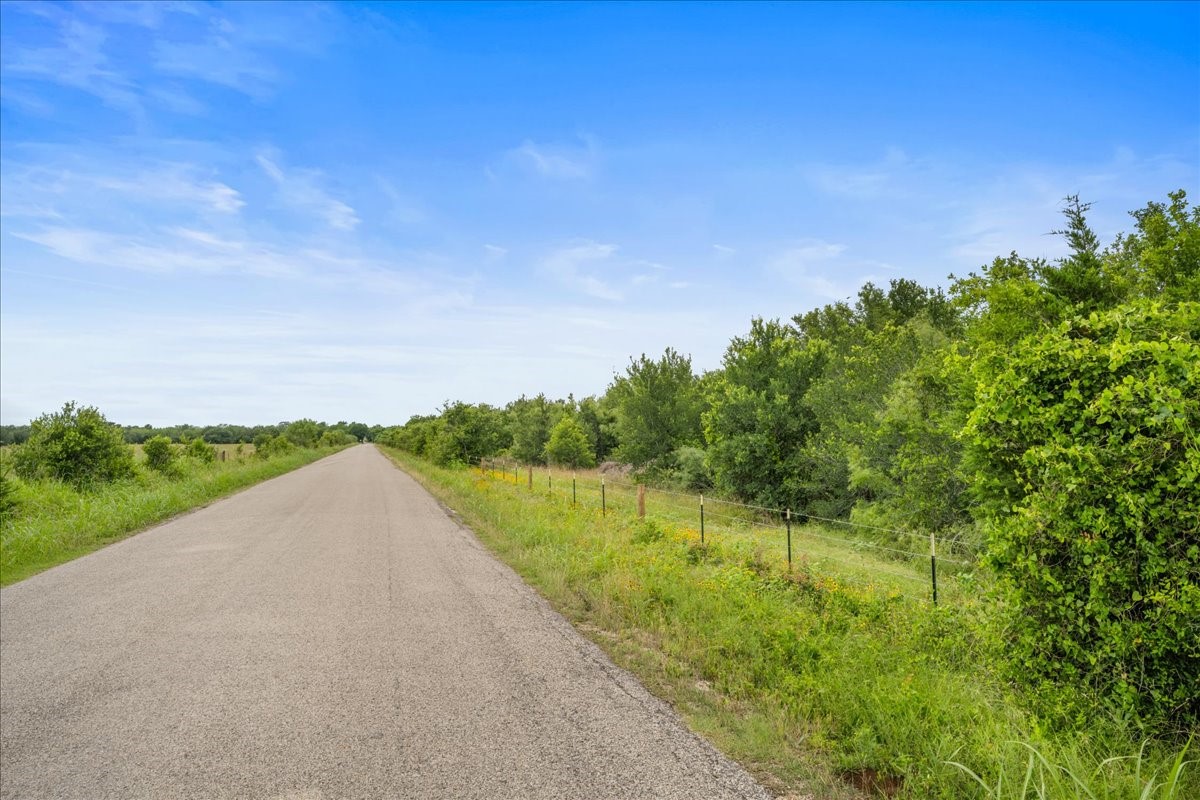 288 Charcoal Road Rosanky, TX 78953 - Photo 17 of 23 a view of a lake with a yard