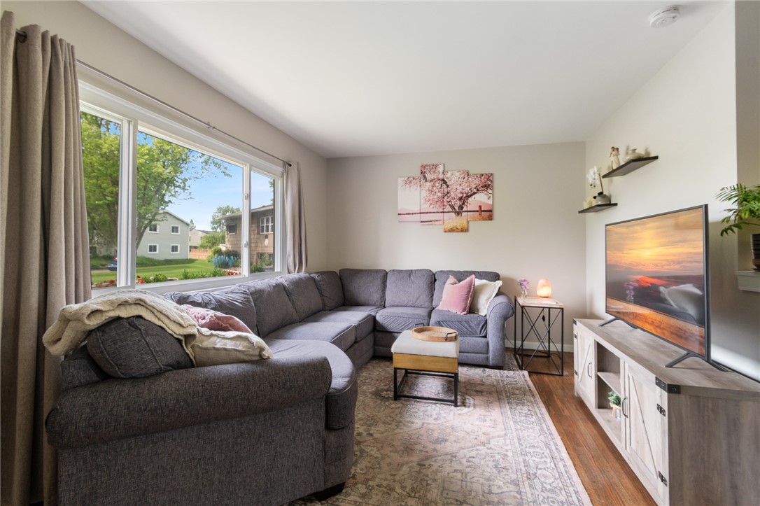 218 Kusak Road Henrietta, NY 14467 - Photo 28 of 33 Living room with huge picture window for lots of l