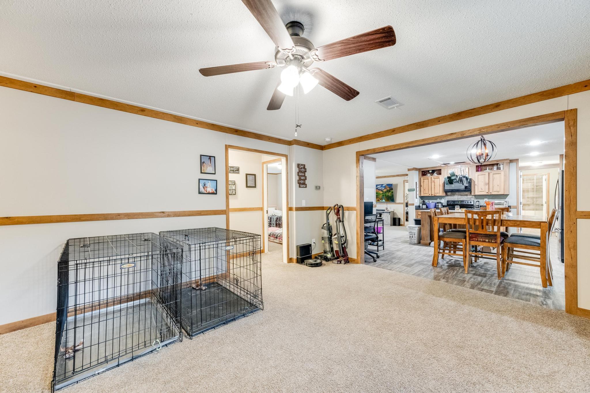 6224 Old River Road Baker, FL 32531 - Photo 14 of 35 a view of a livingroom with furniture and a ceiling fan