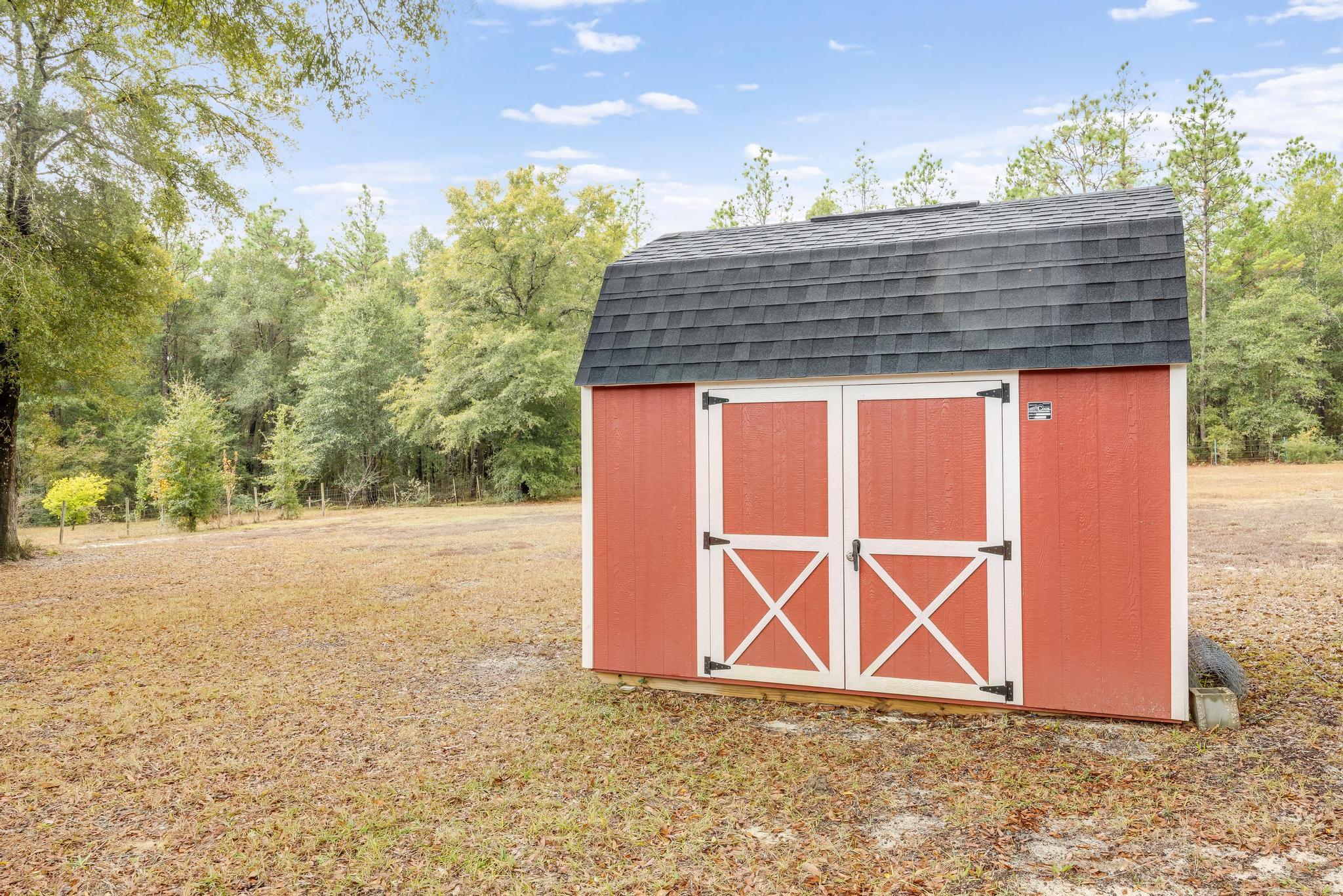 6224 Old River Road Baker, FL 32531 - Photo 32 of 35 a house view with a outdoor space