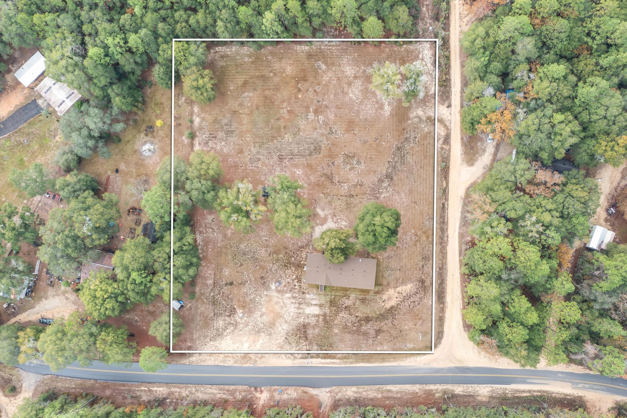 6224 Old River Road Baker, FL 32531 - Photo 35 of 35 front view of a house with a yard