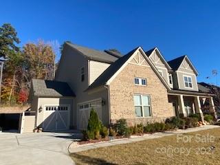 7008 Fallondale Road Waxhaw, NC 28173 - Photo 3 of 29 a front view of a house with a yard