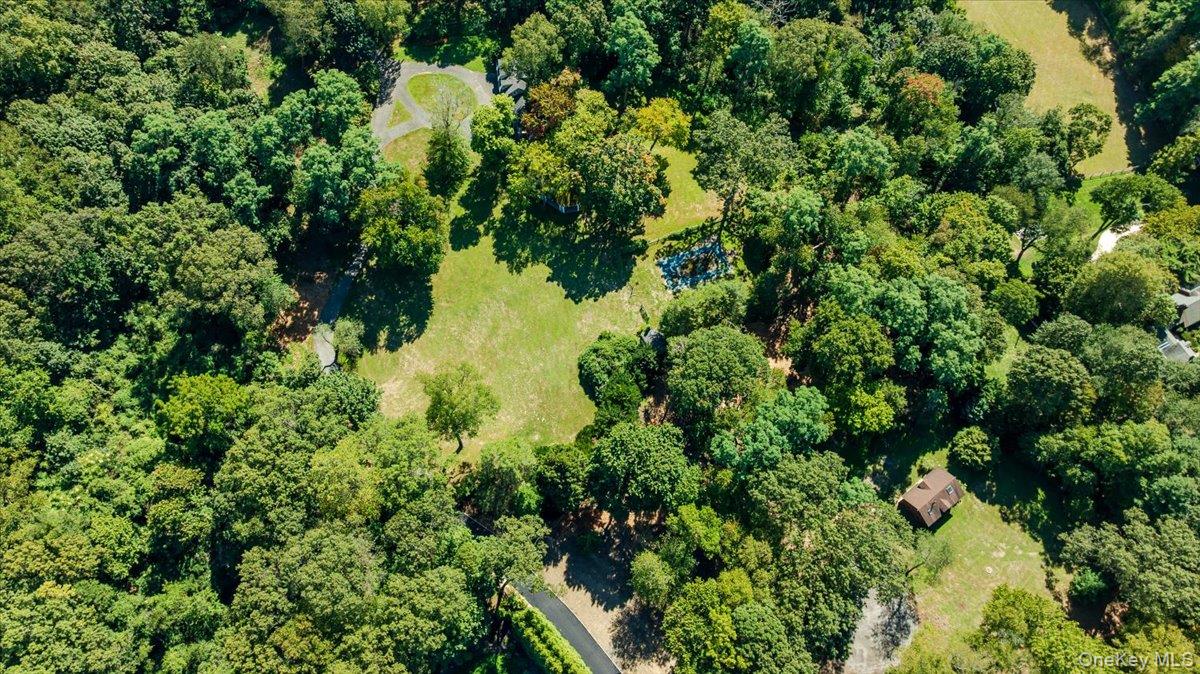 34 Yellow Cote Road Oyster Bay, NY 11771 - Photo 11 of 19 an aerial view of residential house with outdoor space and trees all around
