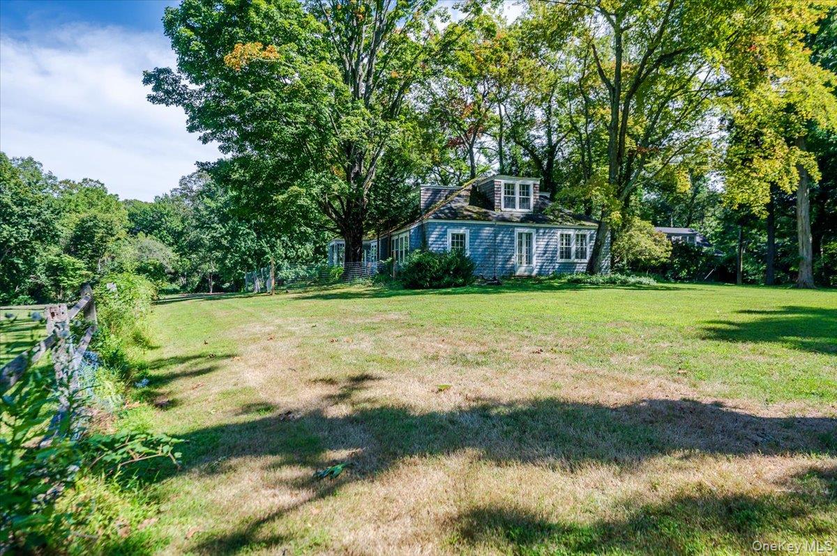 34 Yellow Cote Road Oyster Bay, NY 11771 - Photo 8 of 19 a view of a backyard with a small pool