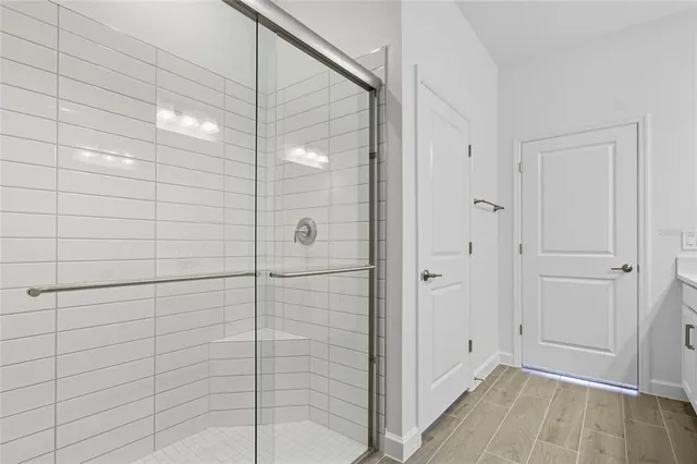 a bathroom with a sink double vanity and a mirror