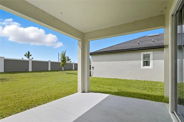 a view of a backyard with a garden