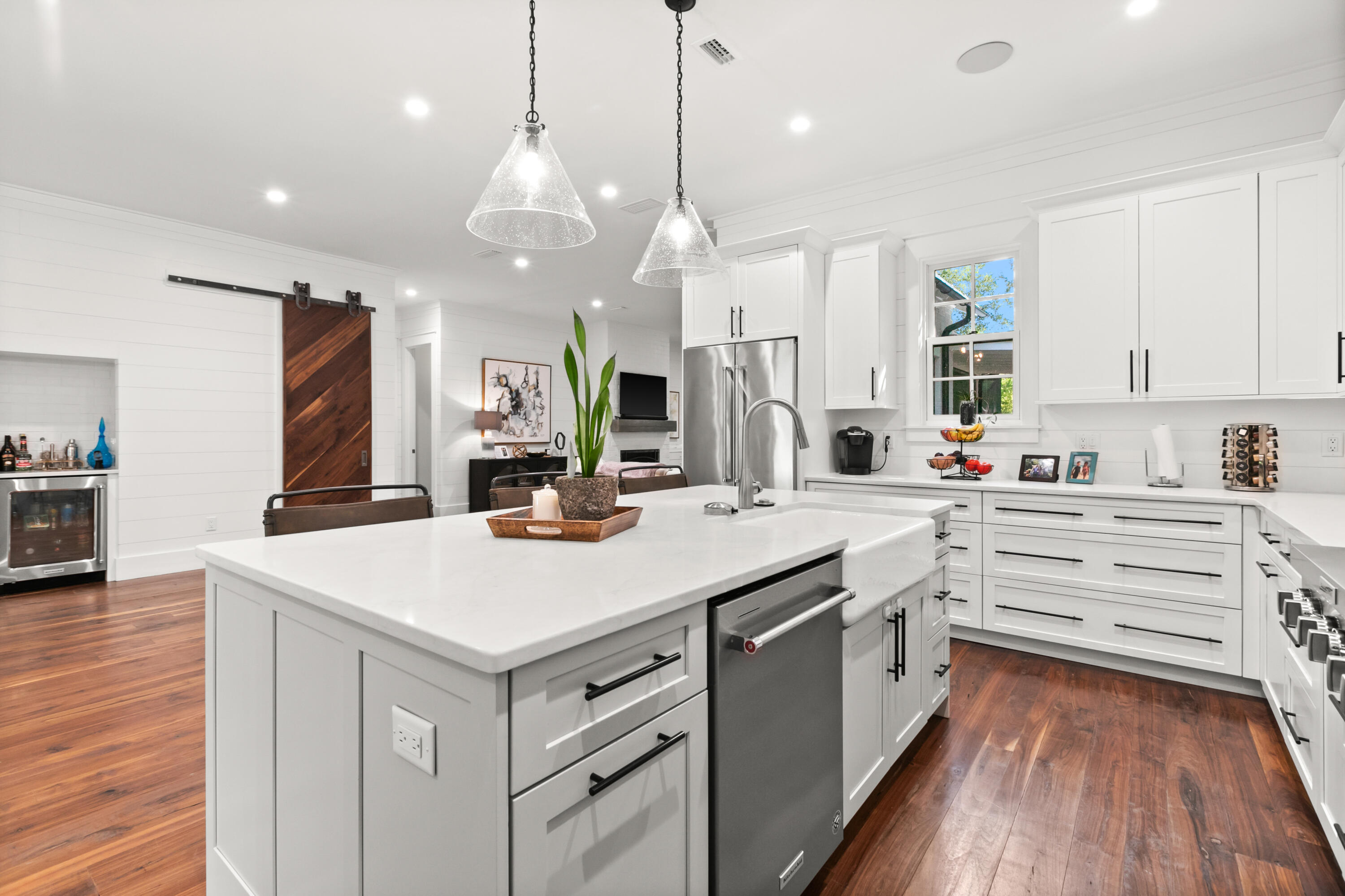 380 Ricker Avenue Santa Rosa Beach, FL 32459 - Photo 12 of 55 a kitchen with a stove a sink and a refrigerator