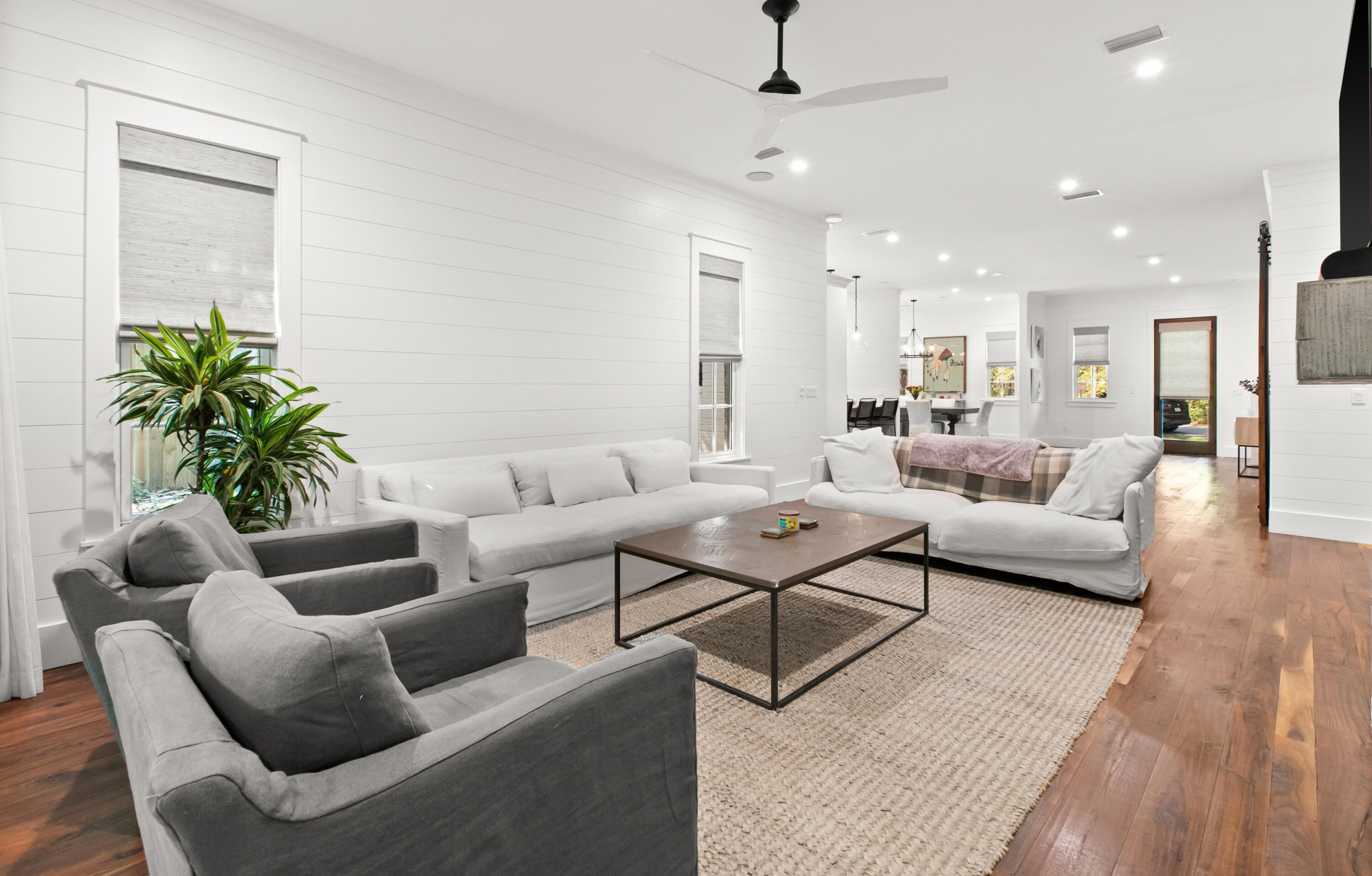 380 Ricker Avenue Santa Rosa Beach, FL 32459 - Photo 18 of 55 a living room with furniture potted plant and a rug