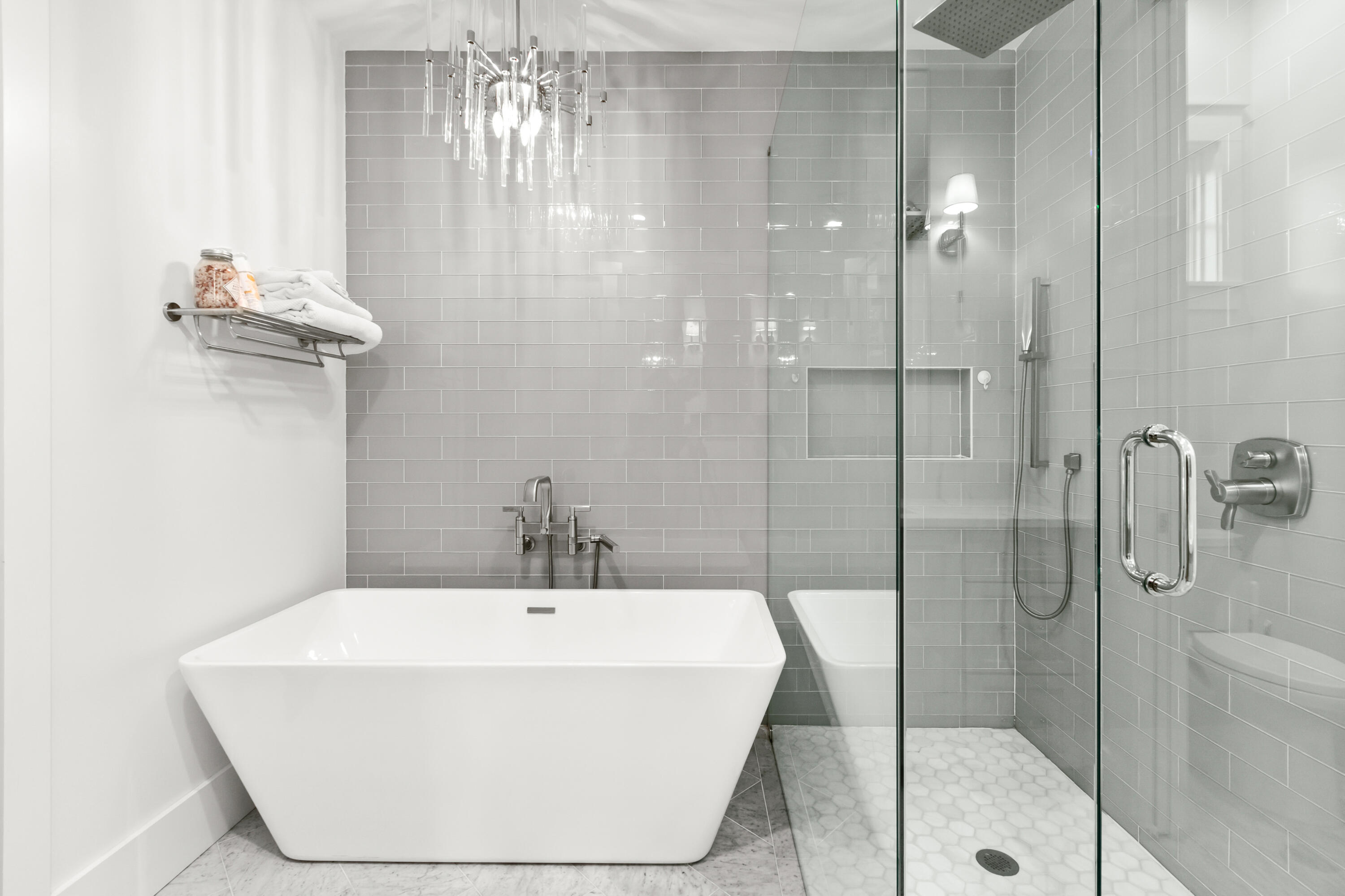 380 Ricker Avenue Santa Rosa Beach, FL 32459 - Photo 23 of 55 a bathroom with a white bath tub sitting next to a shower