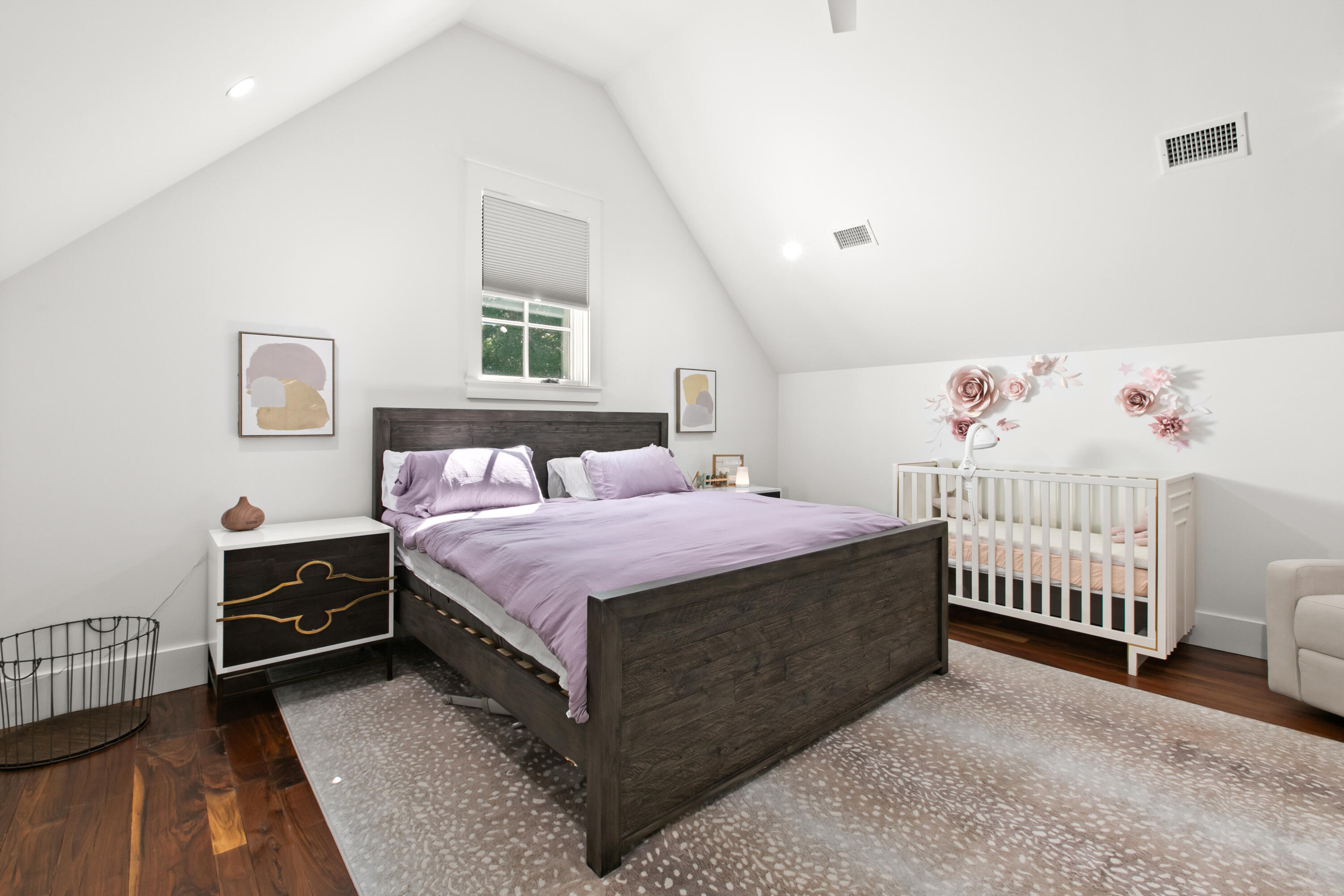 380 Ricker Avenue Santa Rosa Beach, FL 32459 - Photo 30 of 55 a bedroom with a bed and a baby crib