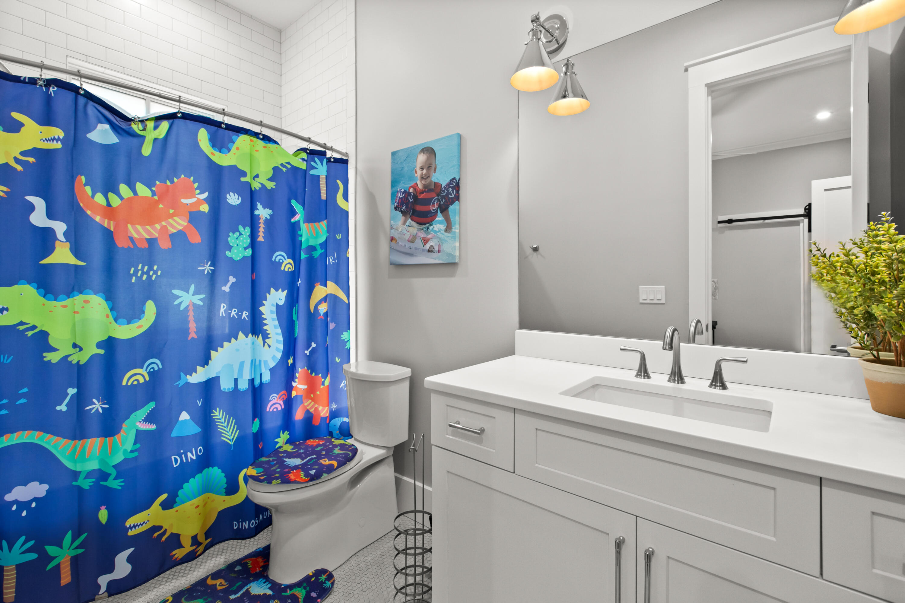 380 Ricker Avenue Santa Rosa Beach, FL 32459 - Photo 34 of 55 a bathroom with a sink mirror and vanity