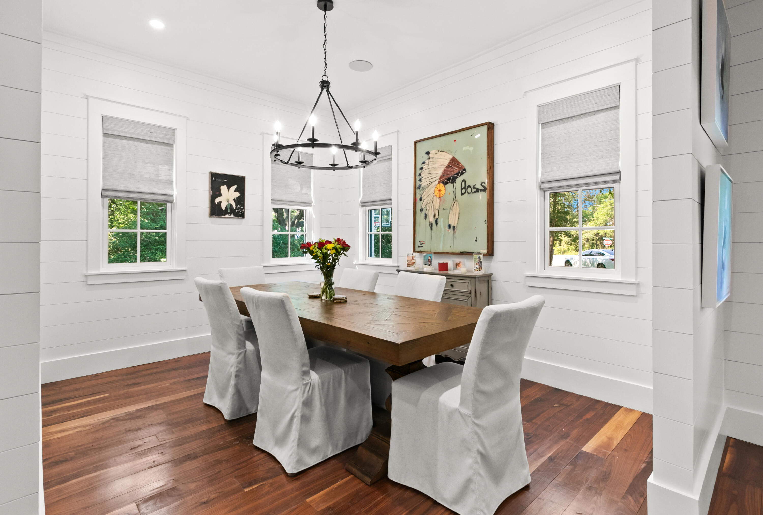 380 Ricker Avenue Santa Rosa Beach, FL 32459 - Photo 9 of 55 a view of a dining room with furniture window and wooden floor
