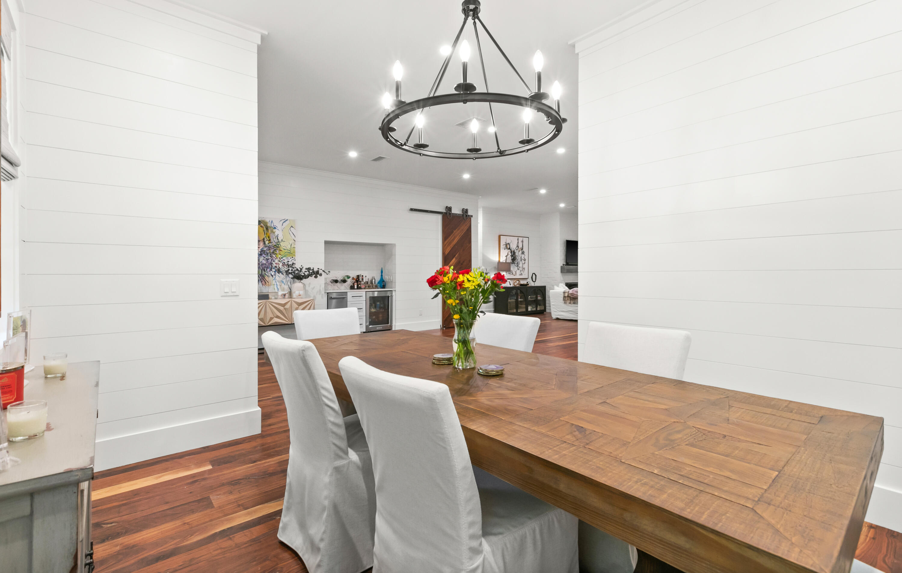 380 Ricker Avenue Santa Rosa Beach, FL 32459 - Photo 10 of 55 a view of a dining room with furniture and wooden floor