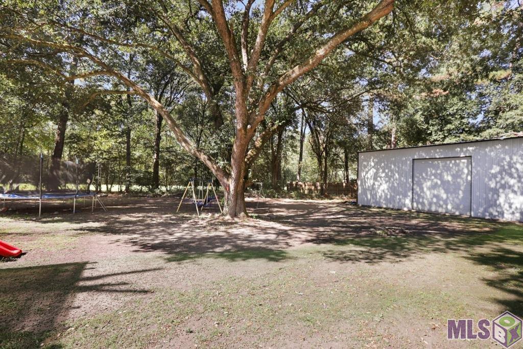 11205 Lazy Lake Drive Baton Rouge, LA 70818 - Photo 26 of 31 Back Yard/Workshop