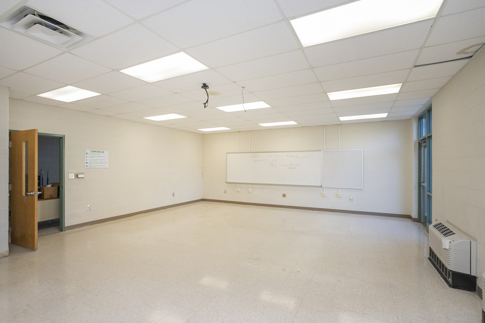 5988 Short Mountain Road Woodbury, TN 37190 - Photo 21 of 53 an empty room with a empty space and windows