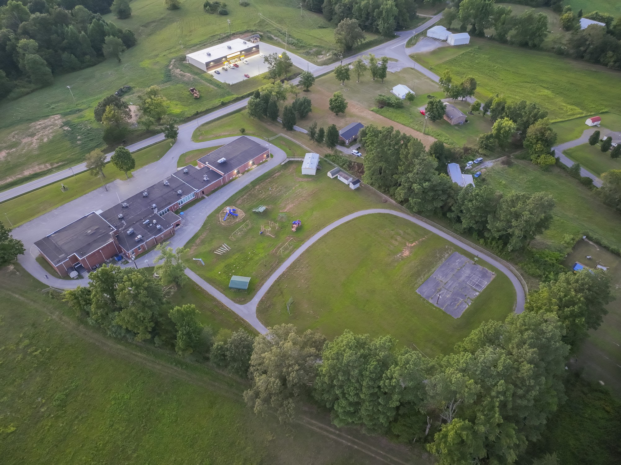 5988 Short Mountain Road Woodbury, TN 37190 - Photo 40 of 53 an aerial view of a residential houses with outdoor space and street view