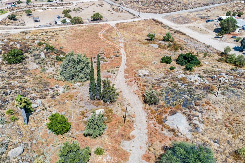 40580 Newport Road Hemet, CA 92544 - Photo 7 of 9 Looking toward West-former home in foreground before cypress trees.