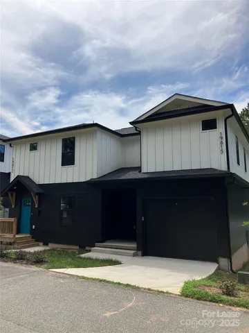 a house view with a garden space
