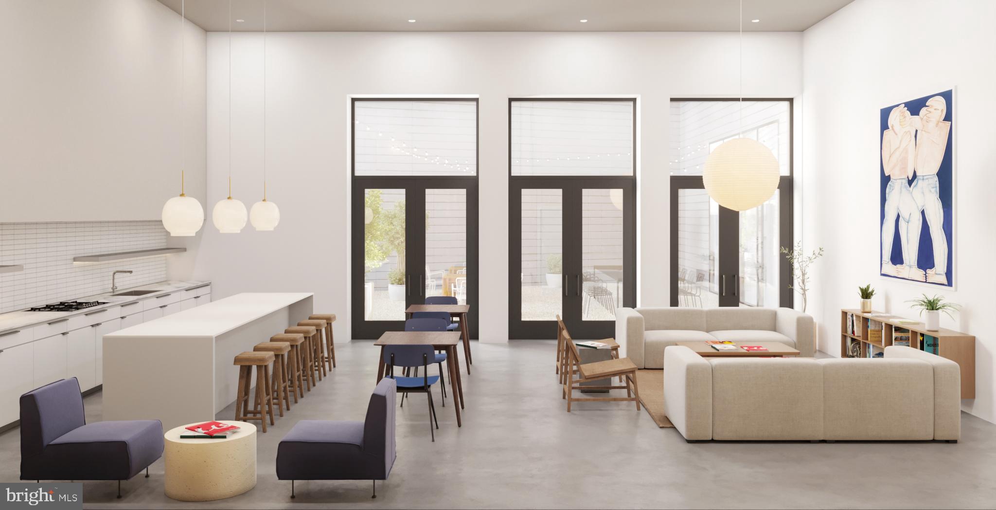 945 Frankford Avenue, Unit 208 Philadelphia, PA 19125 - Photo 5 of 20 a living room with furniture and a large window