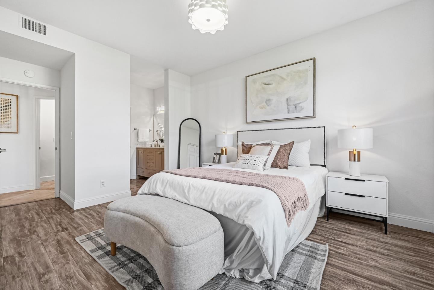 34590 Falls Terrace Fremont, CA 94555 - Photo 20 of 38 a bedroom with a bed and a painting on the wall