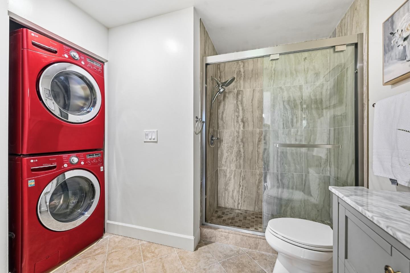 34590 Falls Terrace Fremont, CA 94555 - Photo 23 of 38 a bathroom with a toilet a sink and a shower