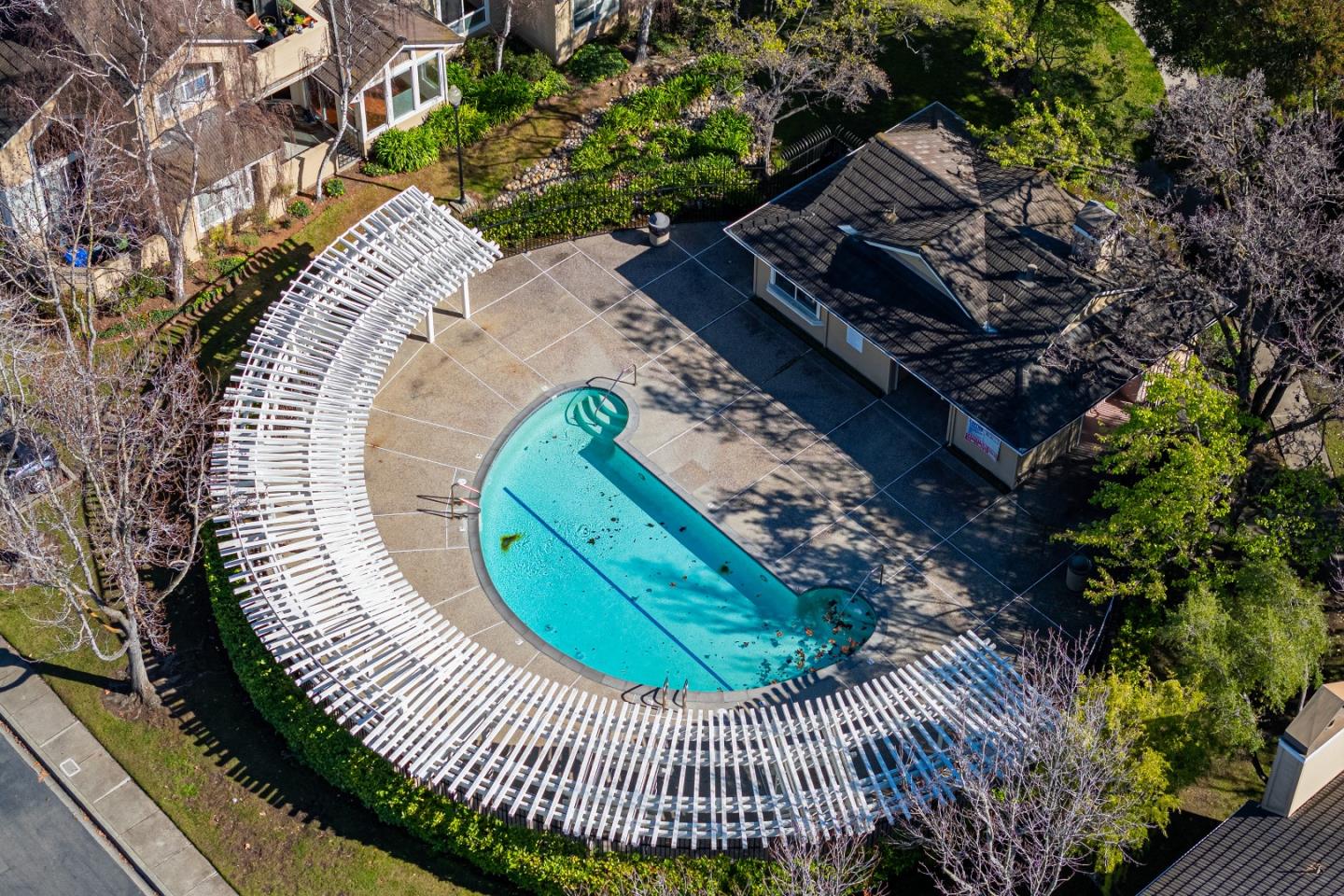 34590 Falls Terrace Fremont, CA 94555 - Photo 30 of 38 a view of a swimming pool with a garden