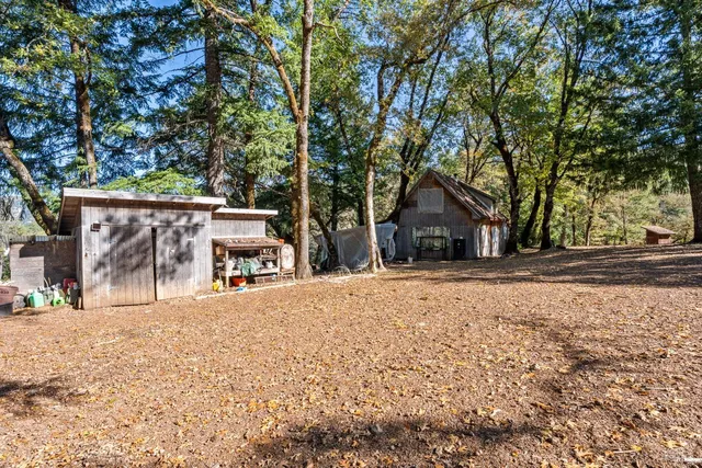 a house with trees in the background