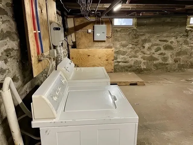 a view of a room with wooden door