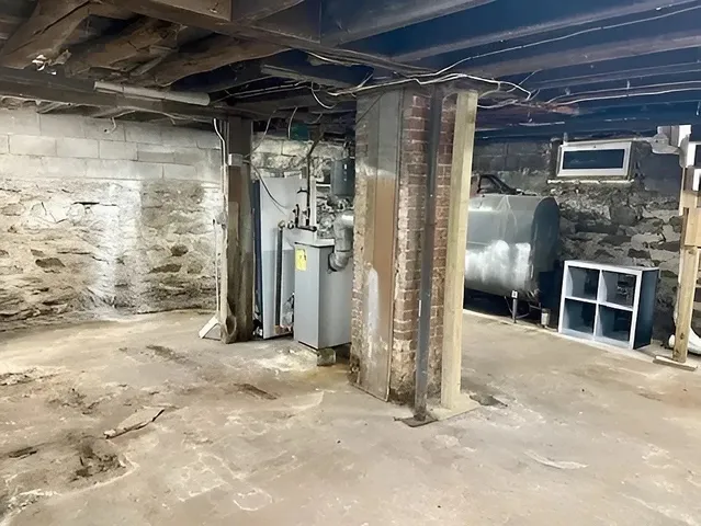 a front view of a house with parking space