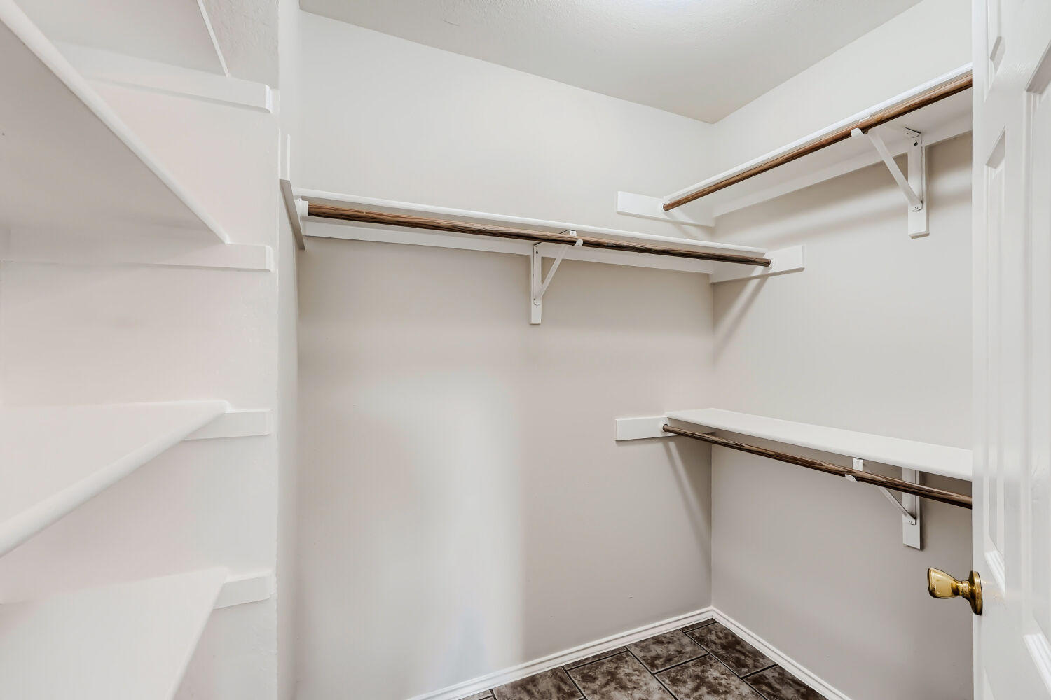 119 Stephen Lane Georgetown, TX 78626 - Photo 12 of 32 Ample shelving and hanging rods provide versatile storage within this spacious walk-in closet.