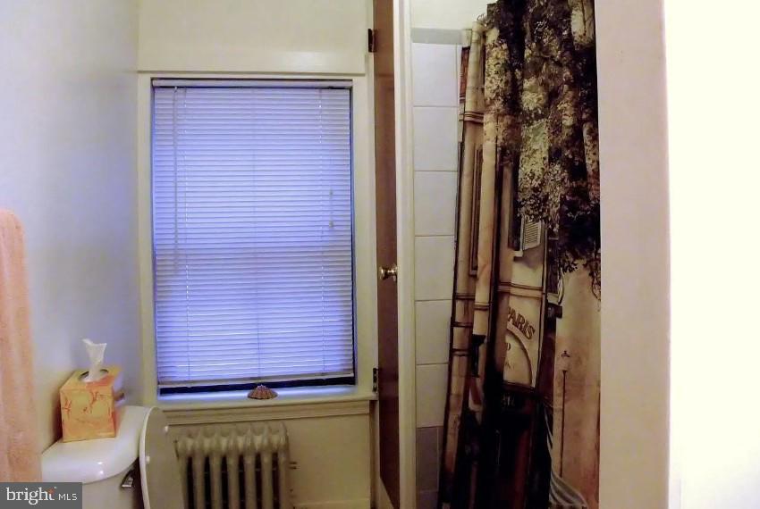 2003 Green Street, Unit 3R Philadelphia, PA 19130 - Photo 6 of 7 a view of a door and chair in the room