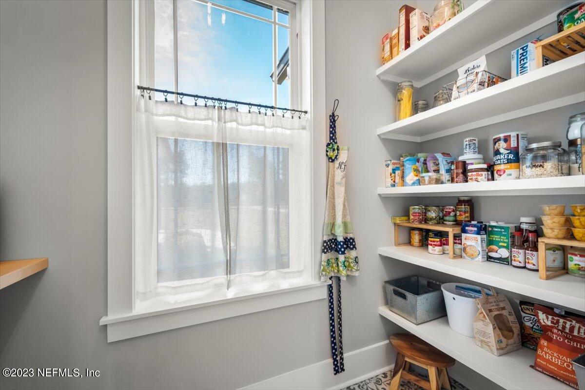 3200 Jane Lane Hilliard, FL 32046 - Photo 21 of 72 a room with a book shelf and a window